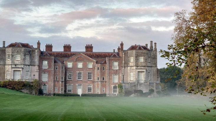 Mottisfont house and lawns with autumn mist